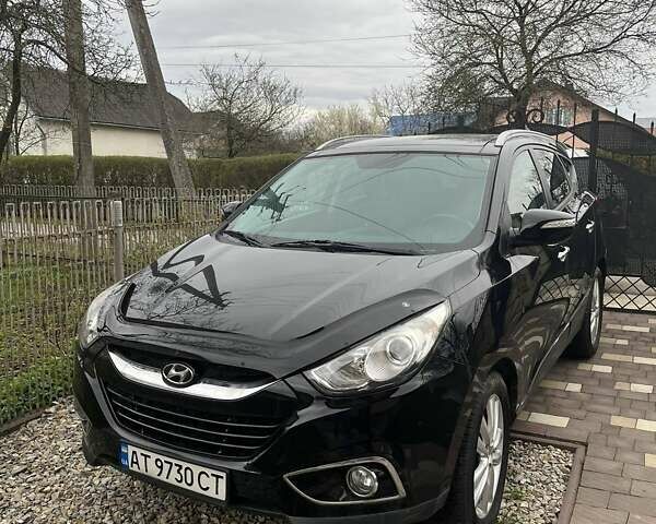 Чорний Хендай іх35, об'ємом двигуна 2 л та пробігом 181 тис. км за 12200 $, фото 1 на Automoto.ua