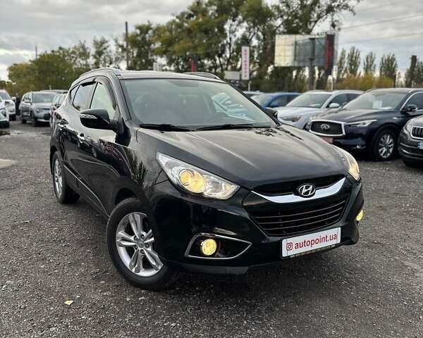 Черный Хендай их35, объемом двигателя 2 л и пробегом 157 тыс. км за 12700 $, фото 1 на Automoto.ua