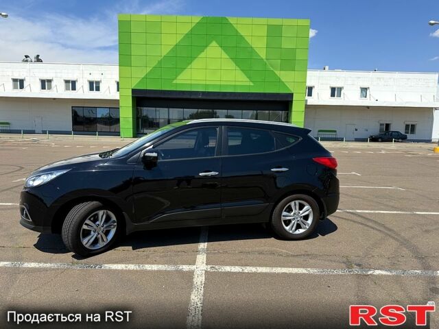 Черный Хендай их35, объемом двигателя 2 л и пробегом 106 тыс. км за 12000 $, фото 1 на Automoto.ua