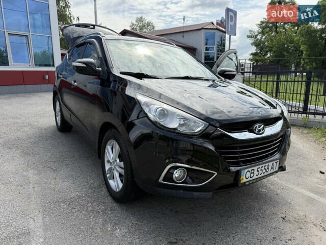 Черный Хендай их35, объемом двигателя 2 л и пробегом 156 тыс. км за 12700 $, фото 1 на Automoto.ua