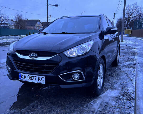 Чорний Хендай іх35, об'ємом двигуна 2 л та пробігом 252 тис. км за 11000 $, фото 1 на Automoto.ua