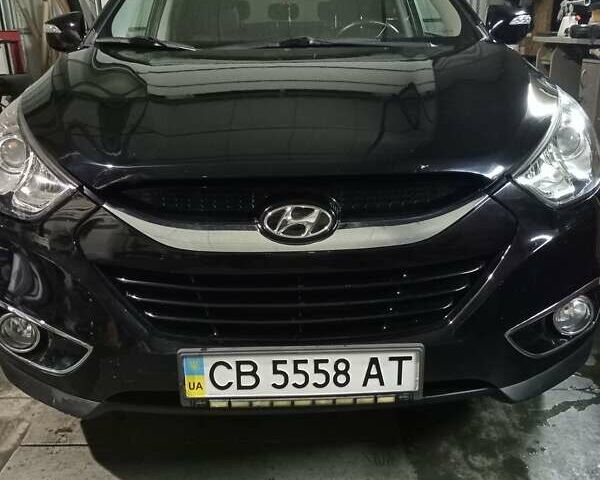 Чорний Хендай іх35, об'ємом двигуна 2 л та пробігом 157 тис. км за 12000 $, фото 1 на Automoto.ua