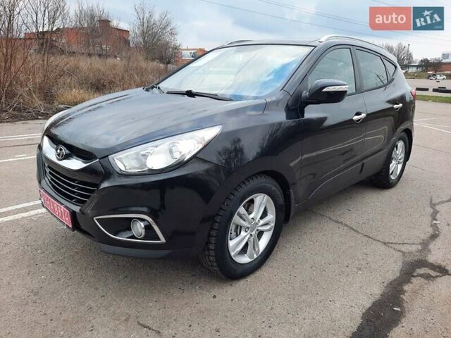 Чорний Хендай іх35, об'ємом двигуна 2 л та пробігом 211 тис. км за 12700 $, фото 1 на Automoto.ua