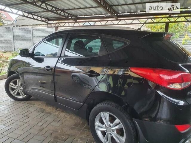 Чорний Хендай іх35, об'ємом двигуна 2 л та пробігом 148 тис. км за 12800 $, фото 1 на Automoto.ua