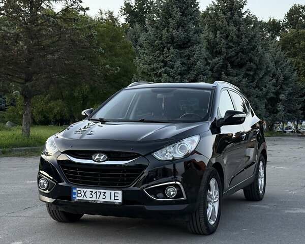 Чорний Хендай іх35, об'ємом двигуна 2 л та пробігом 173 тис. км за 13800 $, фото 1 на Automoto.ua