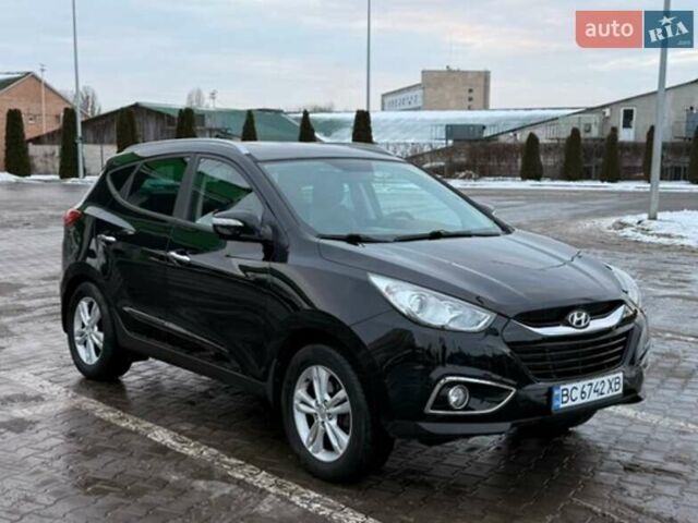 Чорний Хендай іх35, об'ємом двигуна 2 л та пробігом 73 тис. км за 13999 $, фото 1 на Automoto.ua