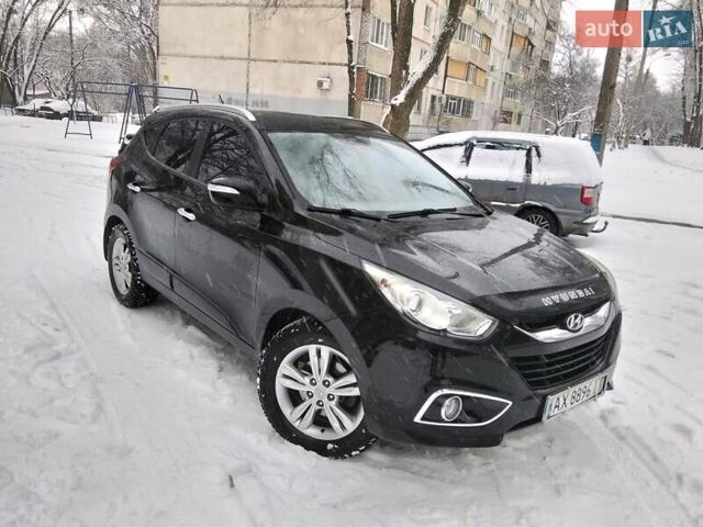 Чорний Хендай іх35, об'ємом двигуна 2 л та пробігом 180 тис. км за 12777 $, фото 1 на Automoto.ua
