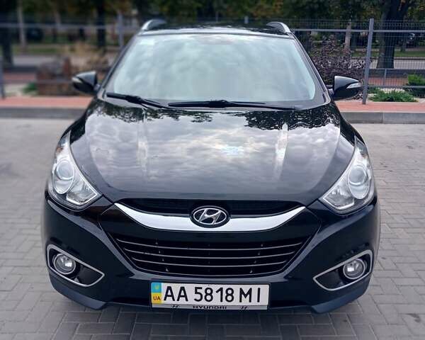Чорний Хендай іх35, об'ємом двигуна 2 л та пробігом 189 тис. км за 12200 $, фото 1 на Automoto.ua