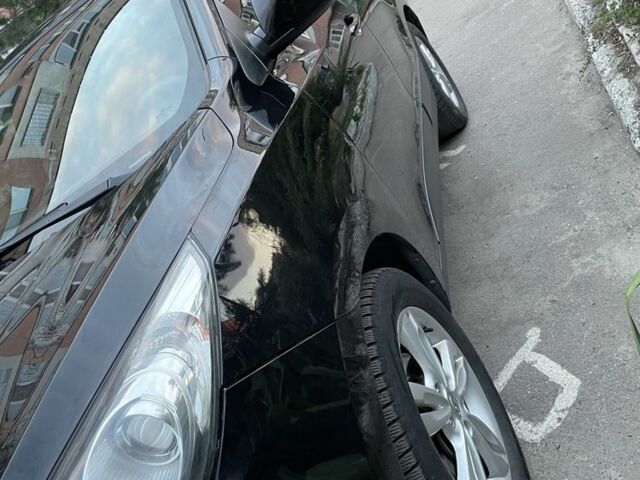 Черный Хендай их35, объемом двигателя 1.7 л и пробегом 272 тыс. км за 13500 $, фото 1 на Automoto.ua