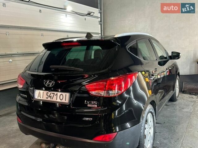 Черный Хендай их35, объемом двигателя 2 л и пробегом 218 тыс. км за 12700 $, фото 1 на Automoto.ua