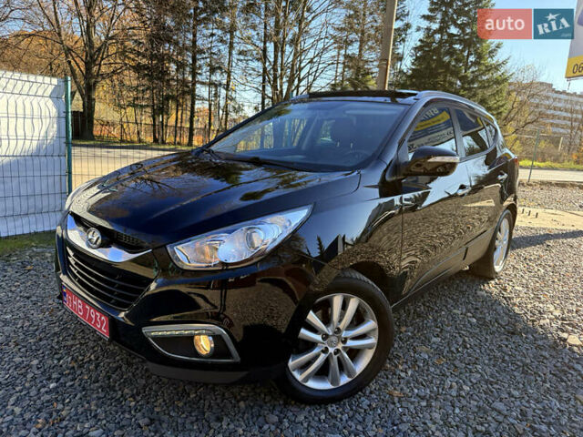 Чорний Хендай іх35, об'ємом двигуна 2 л та пробігом 153 тис. км за 13999 $, фото 1 на Automoto.ua