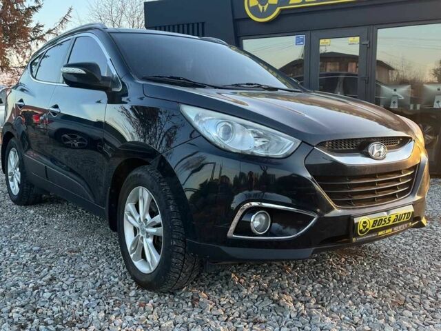 Чорний Хендай іх35, об'ємом двигуна 2 л та пробігом 178 тис. км за 13700 $, фото 1 на Automoto.ua