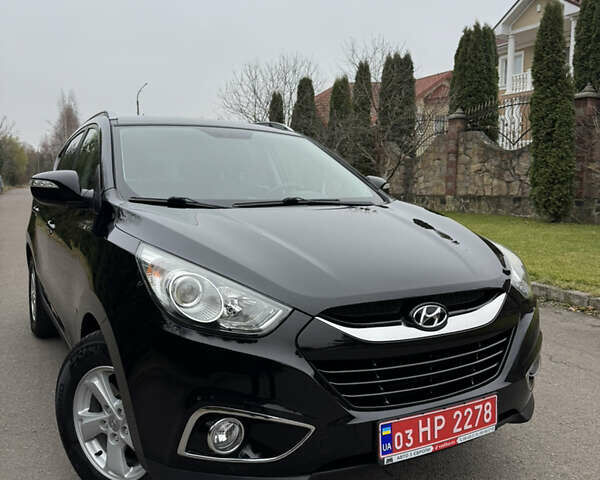 Чорний Хендай іх35, об'ємом двигуна 2 л та пробігом 177 тис. км за 14650 $, фото 1 на Automoto.ua