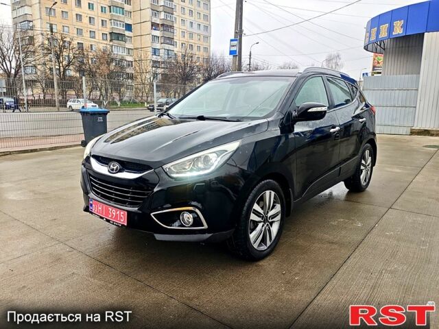 Чорний Хендай іх35, об'ємом двигуна 2 л та пробігом 203 тис. км за 13500 $, фото 1 на Automoto.ua