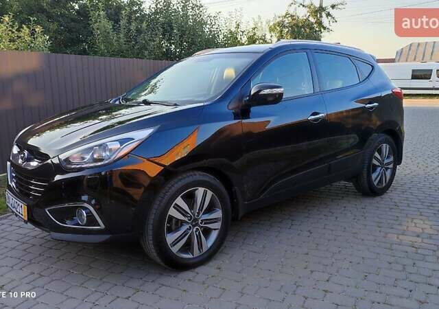 Чорний Хендай іх35, об'ємом двигуна 2 л та пробігом 203 тис. км за 13750 $, фото 1 на Automoto.ua