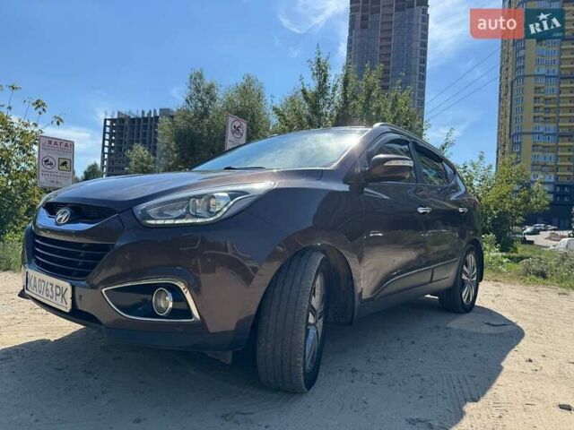 Коричневий Хендай іх35, об'ємом двигуна 2 л та пробігом 175 тис. км за 14970 $, фото 1 на Automoto.ua