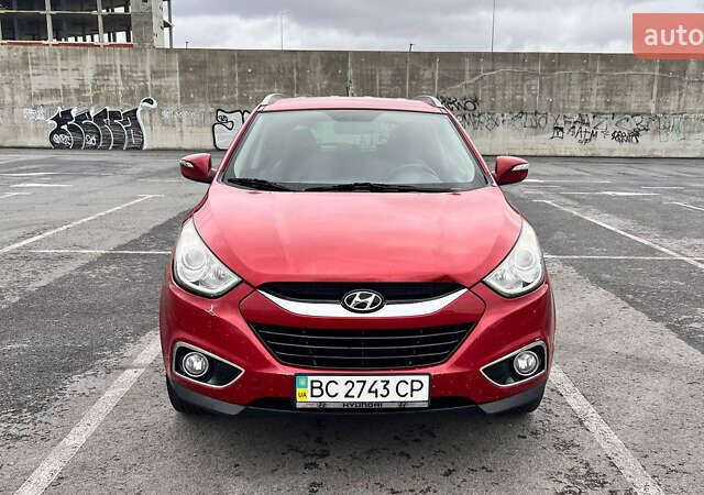 Червоний Хендай іх35, об'ємом двигуна 2 л та пробігом 213 тис. км за 12500 $, фото 1 на Automoto.ua