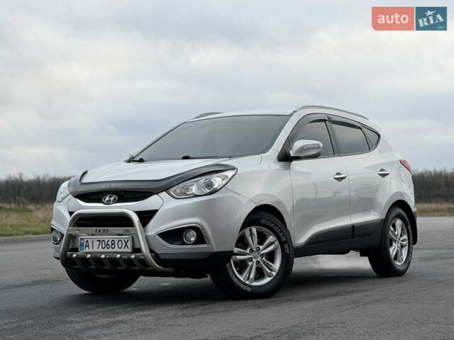 Сірий Хендай іх35, об'ємом двигуна 2 л та пробігом 132 тис. км за 11999 $, фото 1 на Automoto.ua