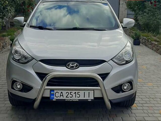 Сірий Хендай іх35, об'ємом двигуна 2 л та пробігом 178 тис. км за 13200 $, фото 1 на Automoto.ua