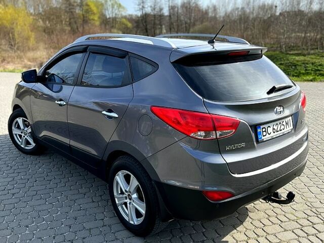Сірий Хендай іх35, об'ємом двигуна 2.4 л та пробігом 220 тис. км за 11950 $, фото 1 на Automoto.ua