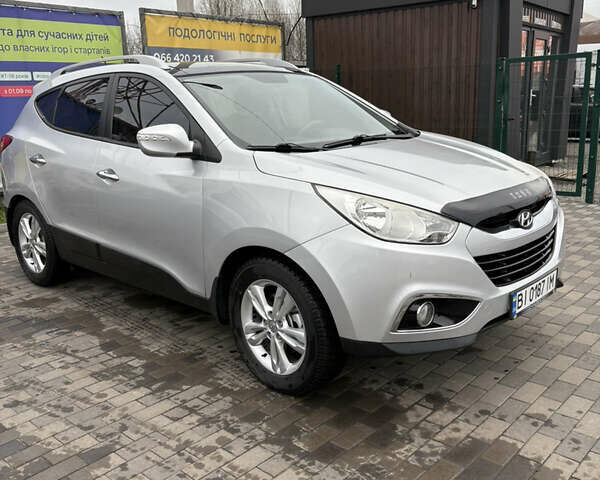 Сірий Хендай іх35, об'ємом двигуна 2 л та пробігом 237 тис. км за 12200 $, фото 1 на Automoto.ua