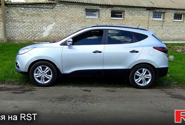 Сірий Хендай іх35, об'ємом двигуна 2 л та пробігом 97 тис. км за 12999 $, фото 1 на Automoto.ua