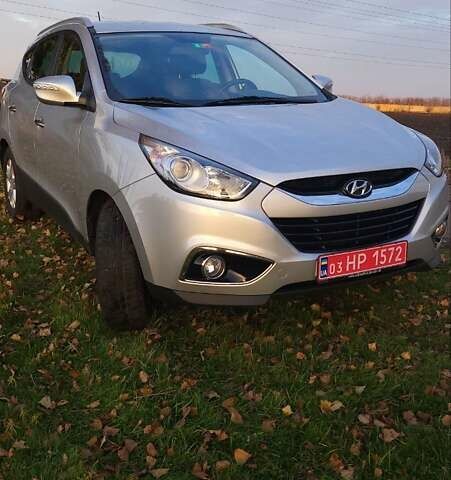 Сірий Хендай іх35, об'ємом двигуна 2 л та пробігом 208 тис. км за 14750 $, фото 1 на Automoto.ua