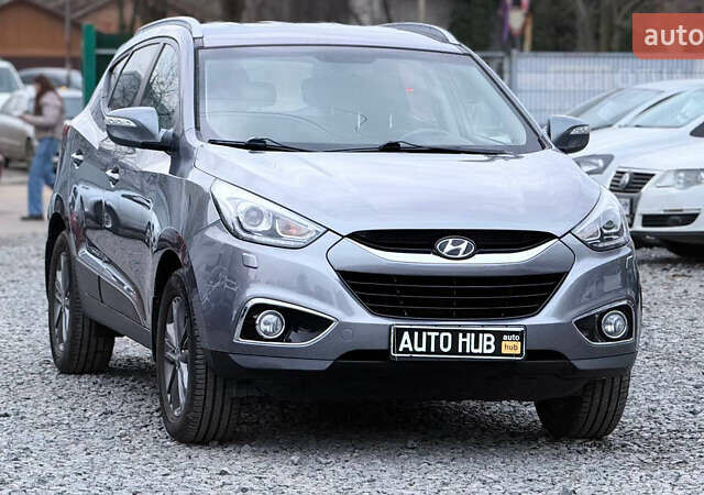 Сірий Хендай іх35, об'ємом двигуна 2 л та пробігом 240 тис. км за 13000 $, фото 1 на Automoto.ua