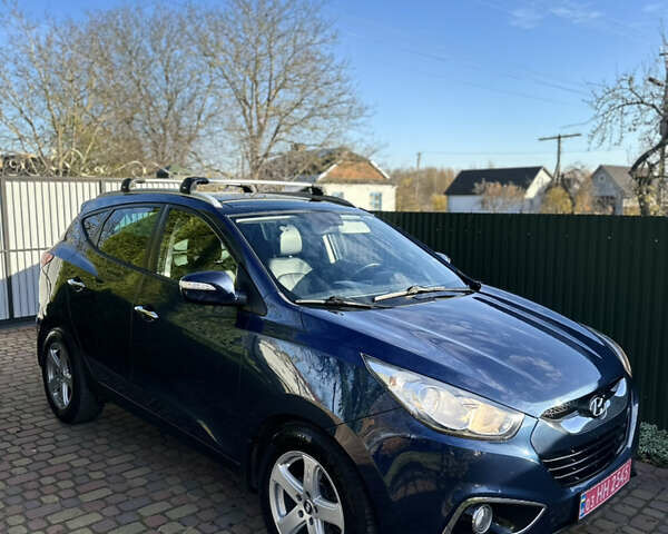 Синій Хендай іх35, об'ємом двигуна 2 л та пробігом 179 тис. км за 12999 $, фото 1 на Automoto.ua