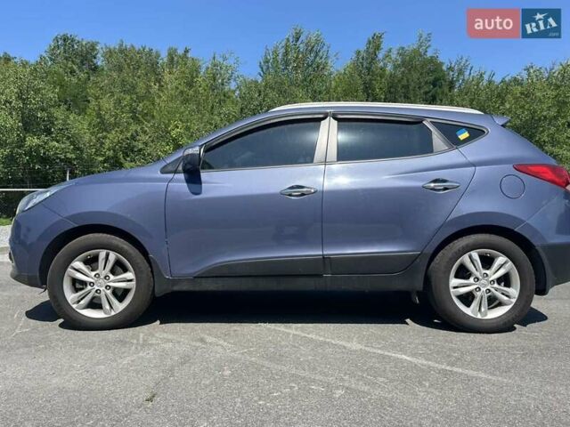 Синий Хендай их35, объемом двигателя 2 л и пробегом 133 тыс. км за 12399 $, фото 1 на Automoto.ua