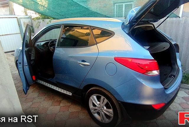 Синий Хендай их35, объемом двигателя 2 л и пробегом 140 тыс. км за 11500 $, фото 1 на Automoto.ua