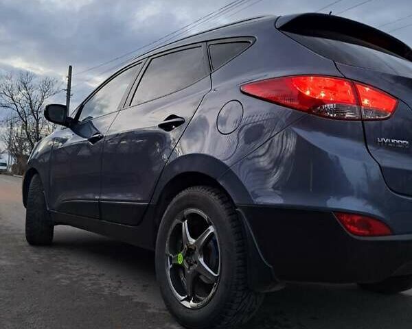 Синій Хендай іх35, об'ємом двигуна 2 л та пробігом 231 тис. км за 12800 $, фото 1 на Automoto.ua