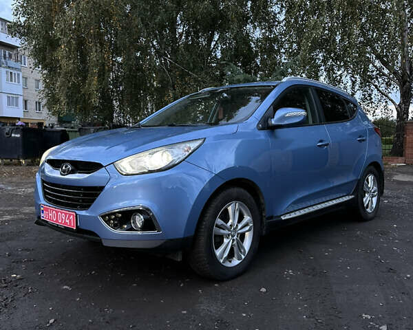 Синий Хендай их35, объемом двигателя 2 л и пробегом 219 тыс. км за 14950 $, фото 1 на Automoto.ua