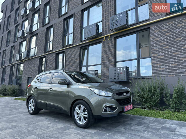 Зелений Хендай іх35, об'ємом двигуна 2 л та пробігом 212 тис. км за 13650 $, фото 1 на Automoto.ua