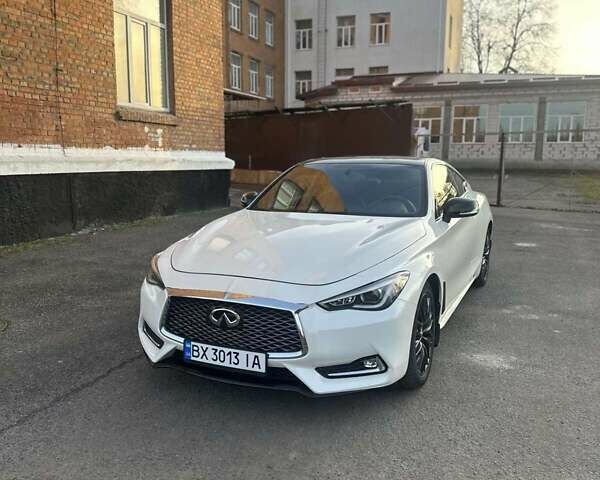 Белый Инфинити Q60, объемом двигателя 3 л и пробегом 69 тыс. км за 20100 $, фото 1 на Automoto.ua