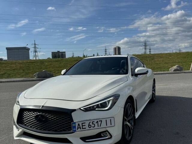 Белый Инфинити Q60, объемом двигателя 3 л и пробегом 113 тыс. км за 26999 $, фото 1 на Automoto.ua