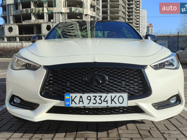 Белый Инфинити Q60, объемом двигателя 3 л и пробегом 94 тыс. км за 23499 $, фото 1 на Automoto.ua