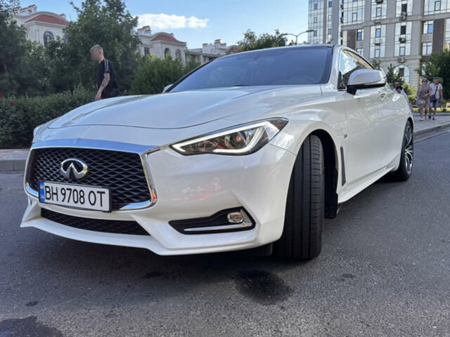 Белый Инфинити Q60, объемом двигателя 3 л и пробегом 80 тыс. км за 22500 $, фото 1 на Automoto.ua