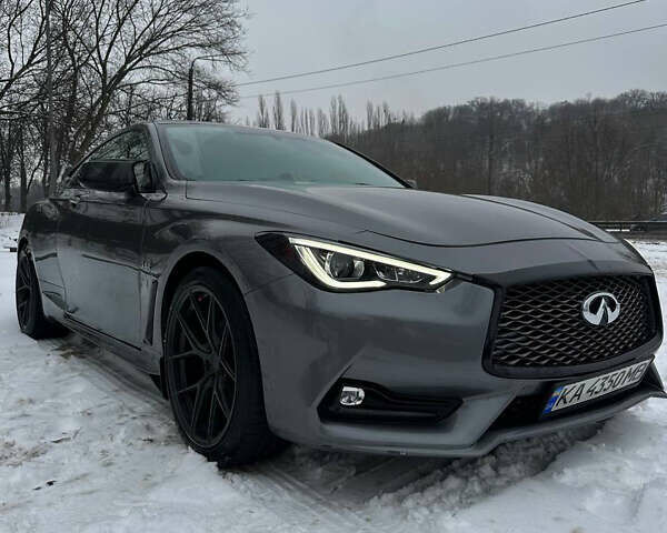 Серый Инфинити Q60, объемом двигателя 3 л и пробегом 128 тыс. км за 23500 $, фото 1 на Automoto.ua