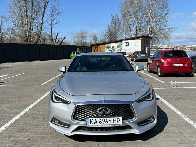 Серый Инфинити Q60, объемом двигателя 2 л и пробегом 116 тыс. км за 20000 $, фото 1 на Automoto.ua