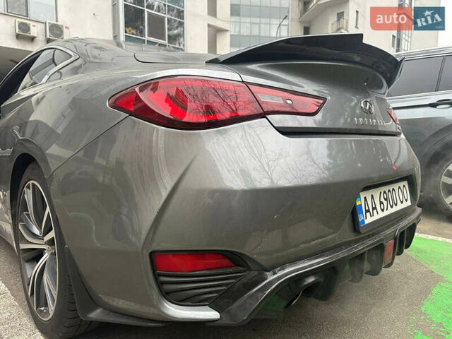 Серый Инфинити Q60, объемом двигателя 3 л и пробегом 82 тыс. км за 18500 $, фото 1 на Automoto.ua
