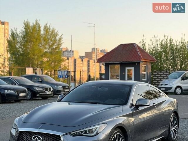 Серый Инфинити Q60, объемом двигателя 3 л и пробегом 63 тыс. км за 23000 $, фото 1 на Automoto.ua