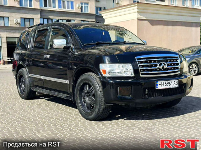 Черный Инфинити КХ, объемом двигателя 5.6 л и пробегом 280 тыс. км за 7200 $, фото 1 на Automoto.ua