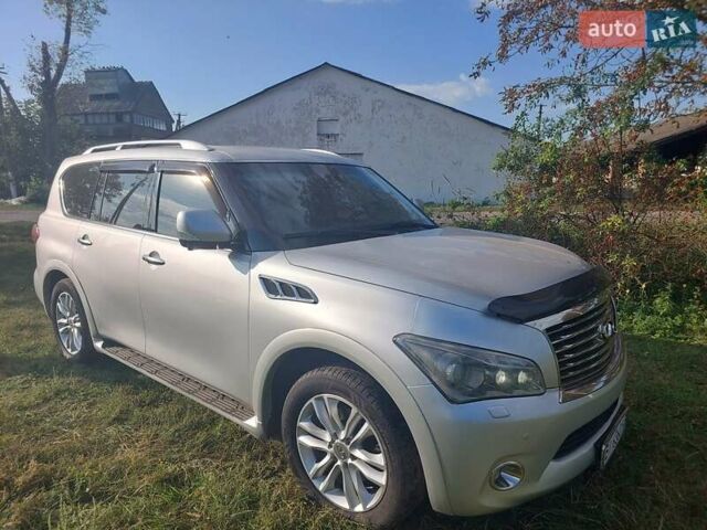 Сірий Інфініті КХ, об'ємом двигуна 5.6 л та пробігом 394 тис. км за 21000 $, фото 1 на Automoto.ua