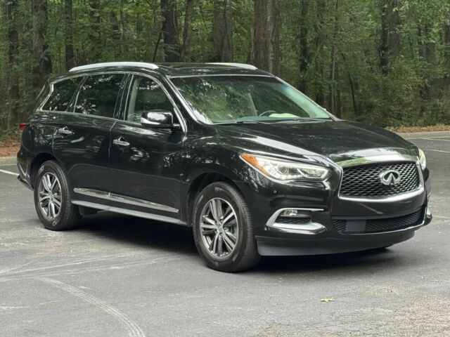 Чорний Інфініті QX60, об'ємом двигуна 3.5 л та пробігом 70 тис. км за 10200 $, фото 1 на Automoto.ua