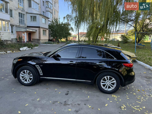 Черный Инфинити QX70, объемом двигателя 3.7 л и пробегом 185 тыс. км за 17999 $, фото 1 на Automoto.ua