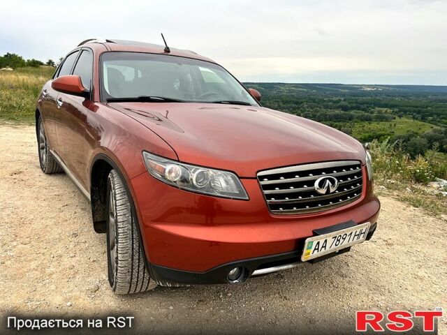 Червоний Інфініті FX 35, об'ємом двигуна 3.5 л та пробігом 205 тис. км за 9700 $, фото 1 на Automoto.ua