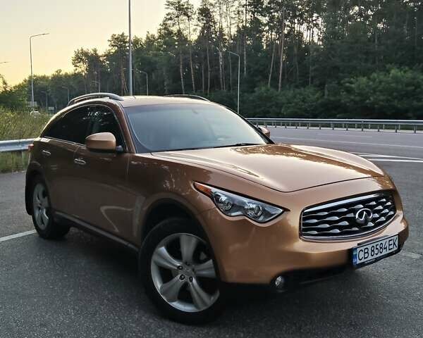 Оранжевый Инфинити FX 35, объемом двигателя 3.5 л и пробегом 150 тыс. км за 11400 $, фото 1 на Automoto.ua