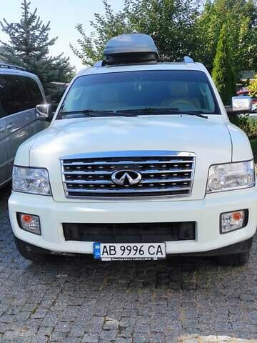 Белый Инфинити QX56, объемом двигателя 5.6 л и пробегом 97 тыс. км за 13000 $, фото 1 на Automoto.ua