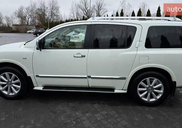 Белый Инфинити QX56, объемом двигателя 5.6 л и пробегом 232 тыс. км за 14000 $, фото 1 на Automoto.ua